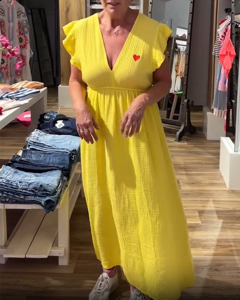 Abito a trapezio con scollo a V e maniche a balze