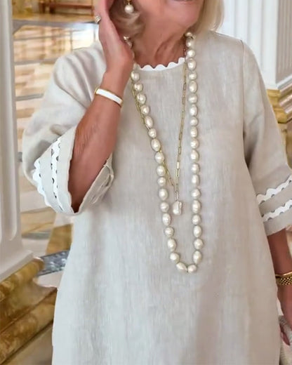 Wave Hem Three-Quarter Sleeve Sheath Dress