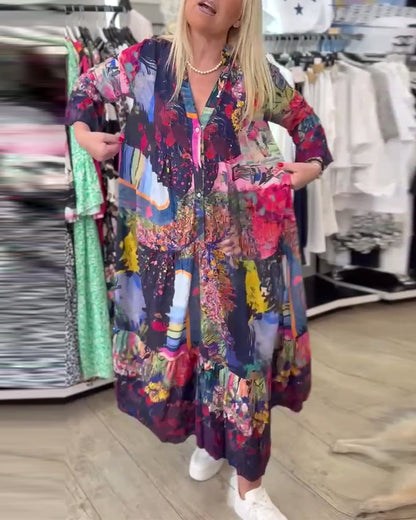 Abito a trapezio con stampa ampia e maniche a tromba