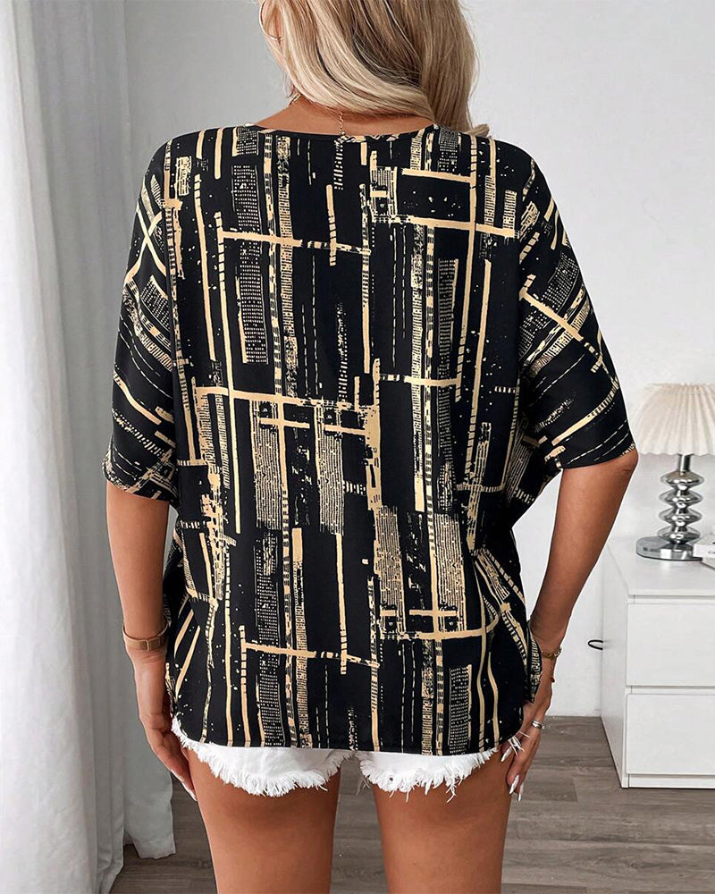 Bedruckte Retro-Bluse mit Fledermausärmeln und V-Ausschnitt