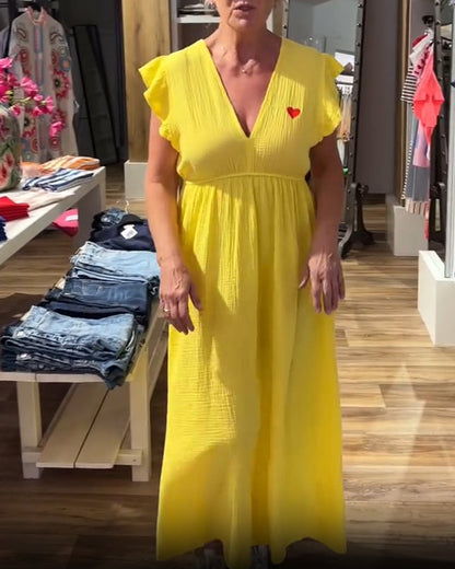 Abito a trapezio con scollo a V e maniche a balze