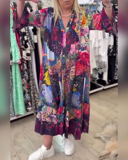 Abito a trapezio con stampa ampia e maniche a tromba