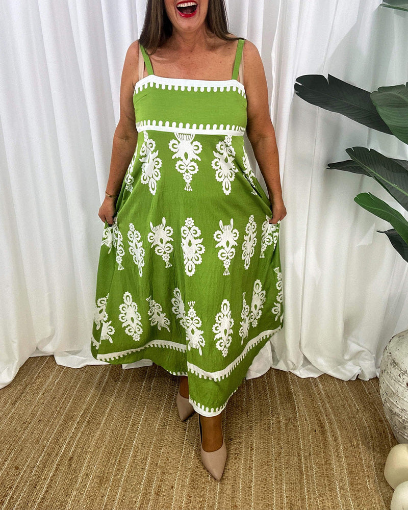 Abito con bretelle senza schienale