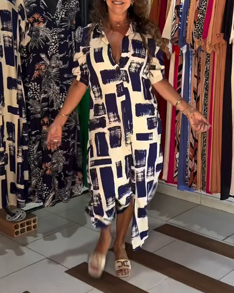 Abito a quadri con spacchi sul revers e blocchi di colore