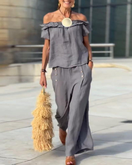 Completo elegante con spalle scoperte