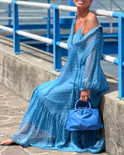 Abito e vestito con stampa a pois e risvolto