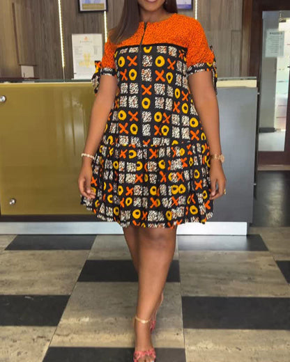 Abito con stampa a contrasto vintage e mezza zip