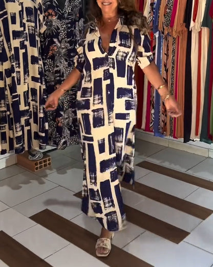 Abito a quadri con spacchi sul revers e blocchi di colore