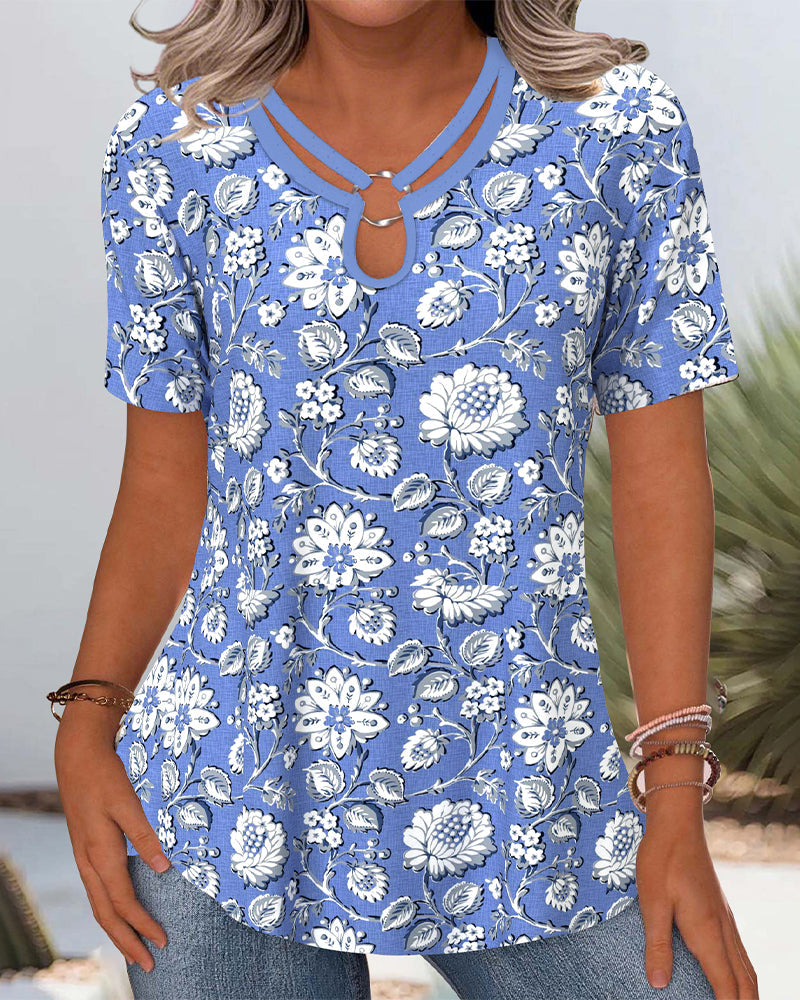 Pendlerbluse mit Rundhalsausschnitt, Blumendruck und Cut-Outs