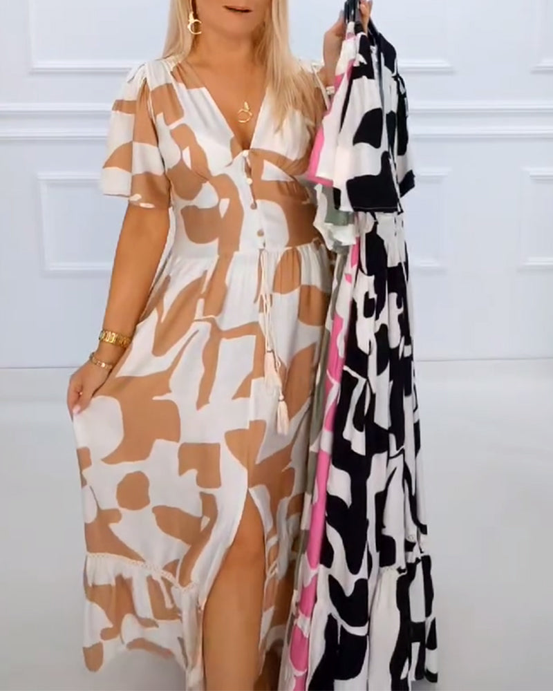 Abito da festa stampato con scollo a V profondo