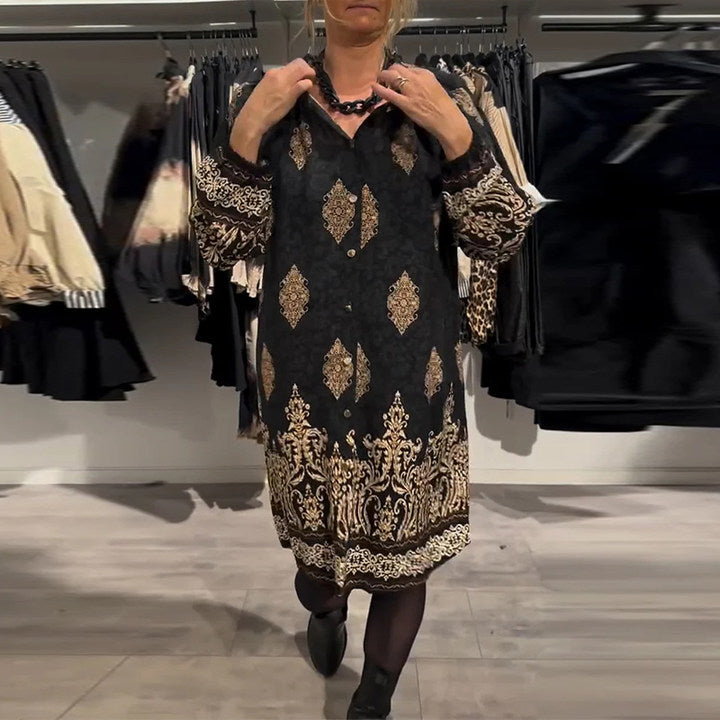 Abito con stampa vintage e bottoni a bavero